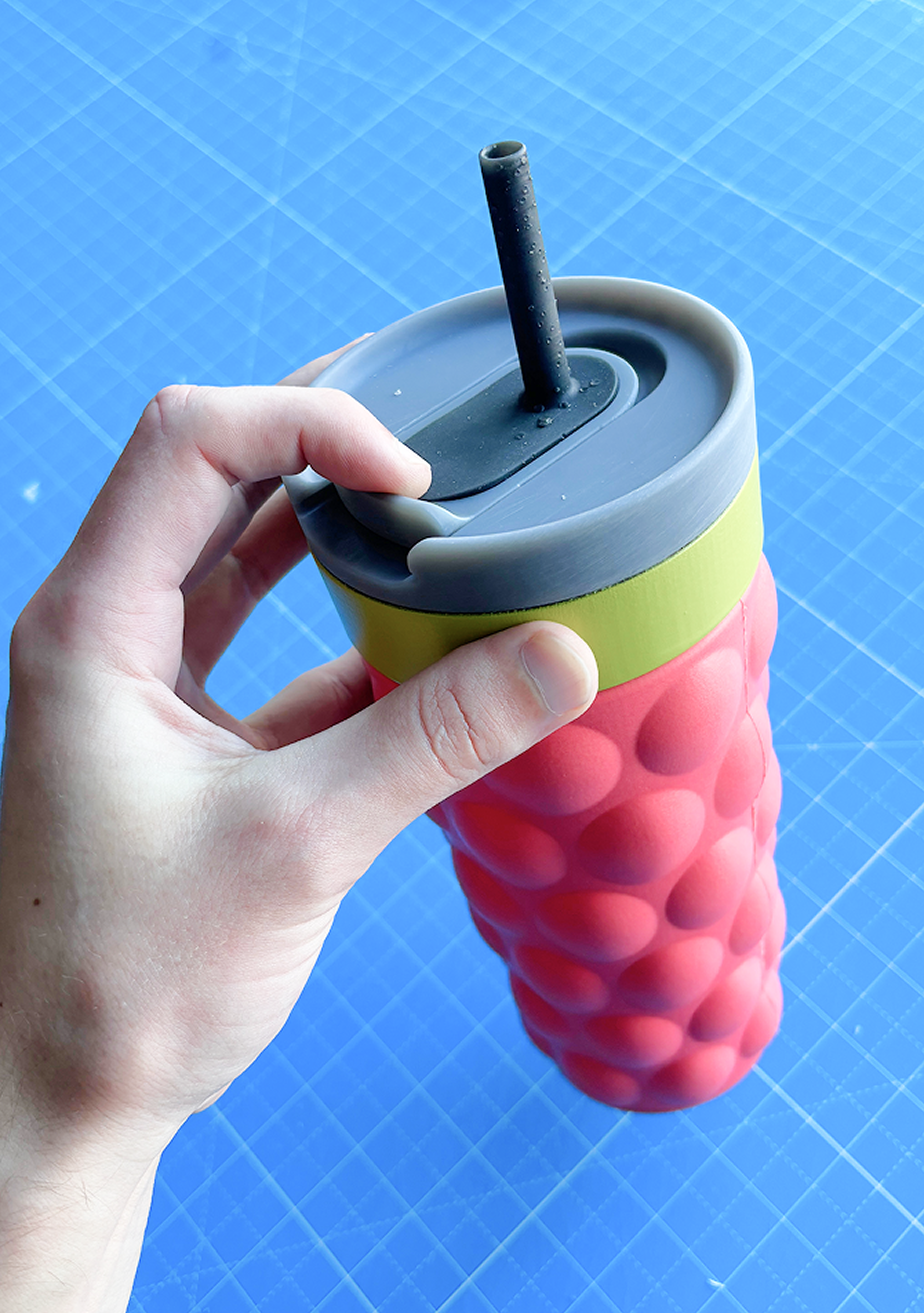 Toggle Tumbler held in hand